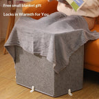 Gray felt under-desk foot warmer with a matching plush fleece blanket draped over the top for extra warmth.