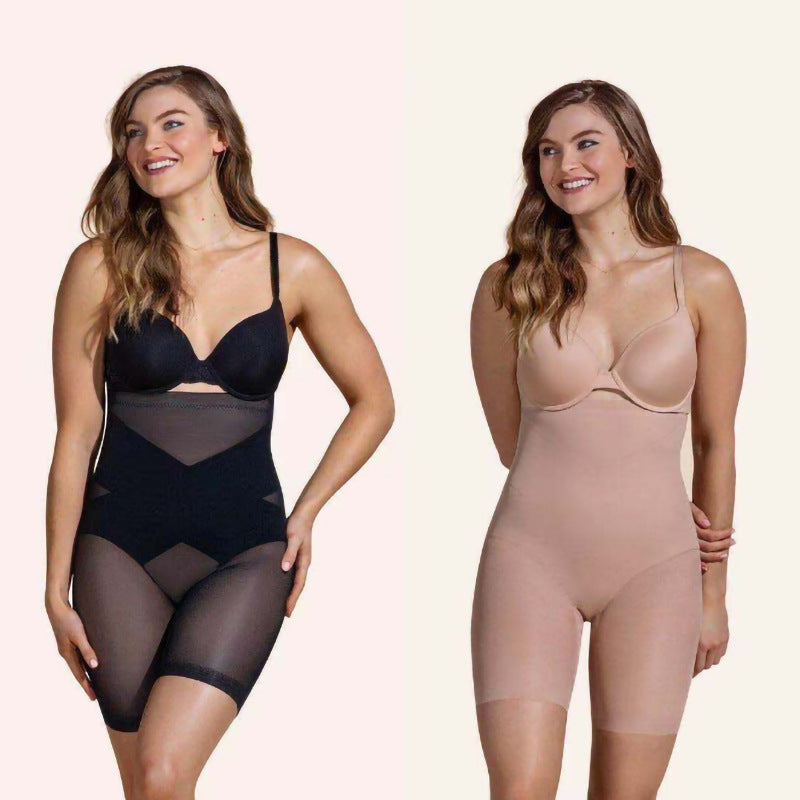 A woman wearing black and beige high-waisted, hip-lifting shapewear shorts that smooth the stomach and thighs.