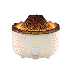 Volcano-shaped aroma diffuser with a cracked white and orange texture, glowing orange flame effect, and a front control.