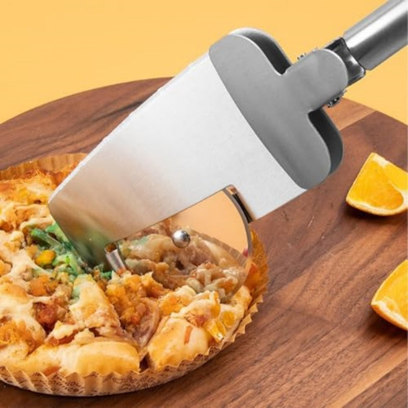 Stainless steel 3-in-1 pizza wheel cutter slicing a small pizza on a wooden board next to orange slices.