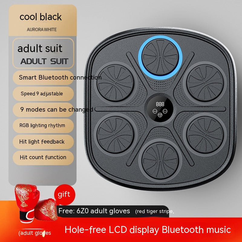 Black wall-mounted music boxing target with LED display and six strike pads. Includes red boxing gloves.