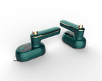 Two portable dark green electric steam irons with gold accents and metal soleplates on a white background.