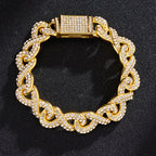 Gold-tone Cuban link bracelet featuring intertwined chain design and pavé-set clear crystals on a black background.