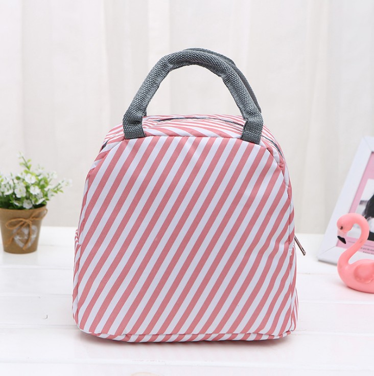 Pink and white diagonal striped insulated lunch bag with gray handles and zipper closure.