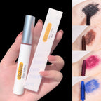 Hand holding a Bobeini mascara tube and box with swatches in black, brown, pink, and blue showing wand application.