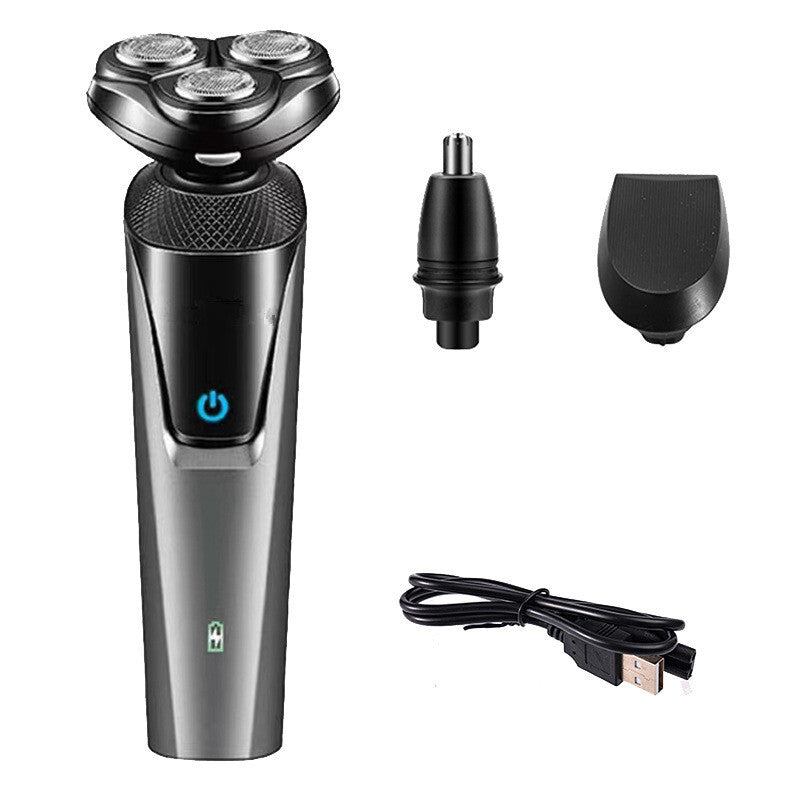 Grey electric rotary shaver with three heads, nose trimmer attachment, blade cover, and USB charging cable.
