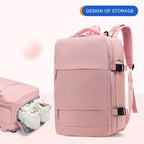 Pink waterproof mummy backpack with side shoe compartment, padded straps, and buckle closures for travel storage.