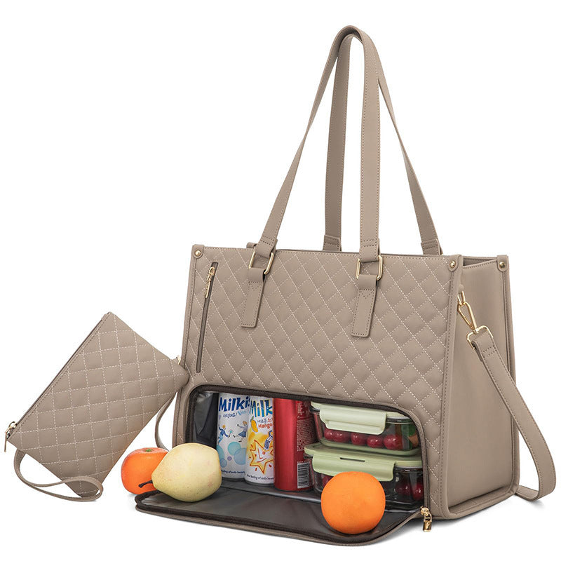 Taupe quilted insulated lunch tote with top handles, crossbody strap, and matching purse, plus a lower food compartment.