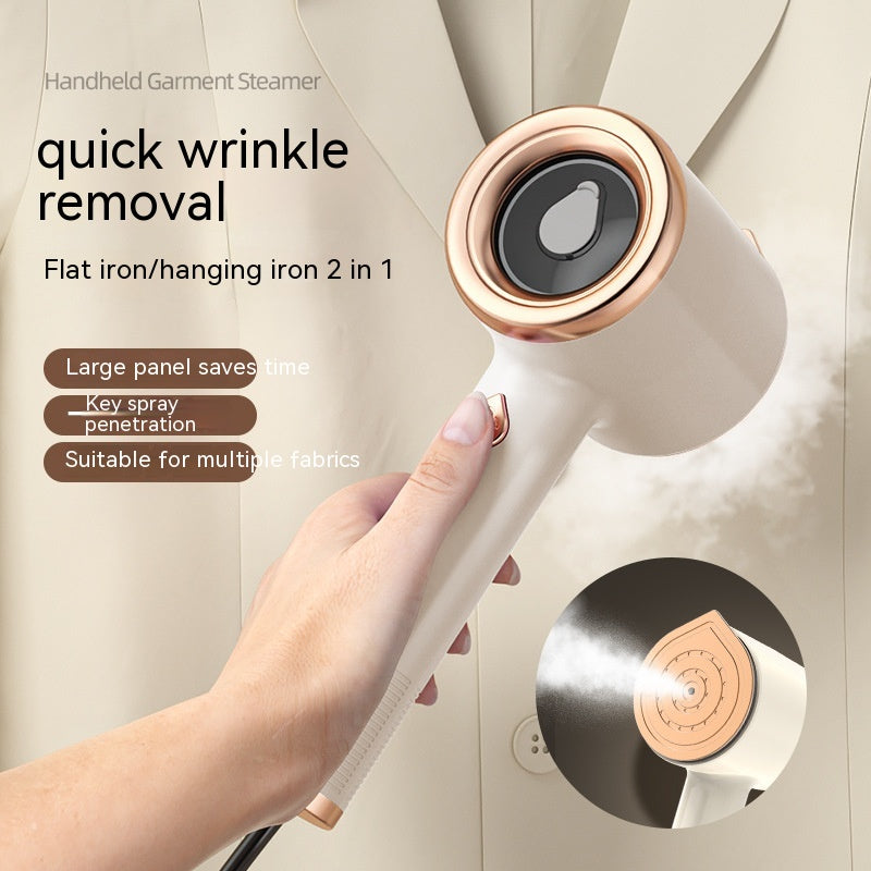 Handheld beige and rose gold garment steamer spraying steam, shown in hand against a light jacket. Inset shows nozzle.