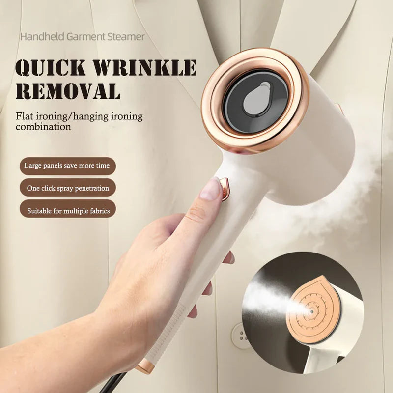 Handheld white and rose gold garment steamer releasing steam, held in a hand against a beige fabric background.