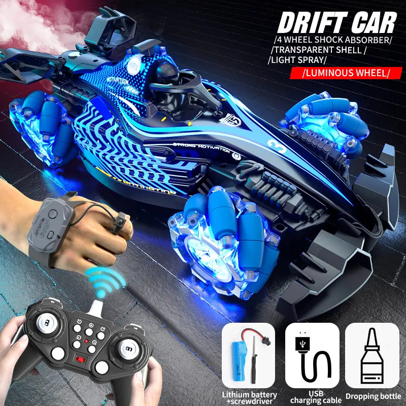 Blue F1-style RC drift car with LED lights, spray exhaust, gesture control, remote, battery, and USB charger.