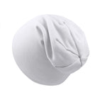 Plain white soft jersey newborn beanie cap with a gathered, slouchy design against a white background.