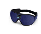 Blue fabric Bluetooth sleep mask with integrated control buttons and adjustable black strap on a white background.