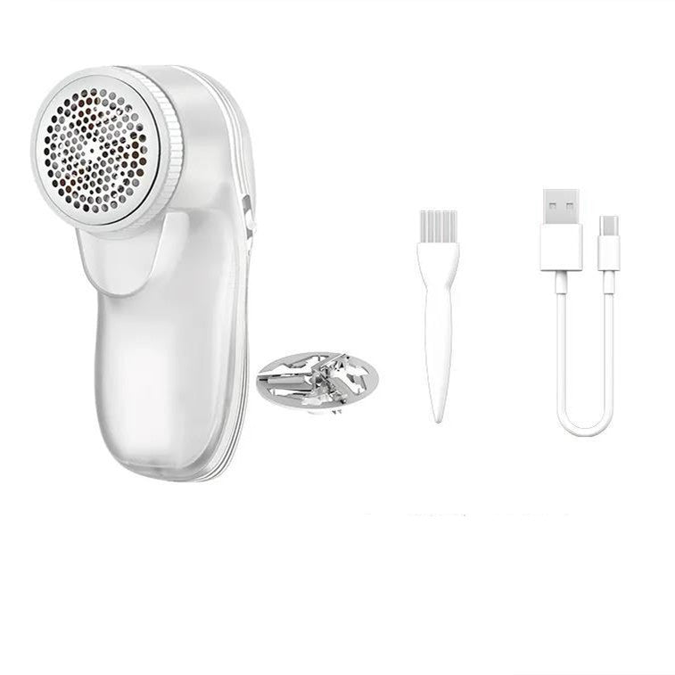 White portable lint remover with metal shaving head, cleaning brush, and USB charging cable on a white background.
