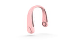 Pink, U-shaped portable neck fan with air vents and a power button on a smooth plastic frame against a white background.