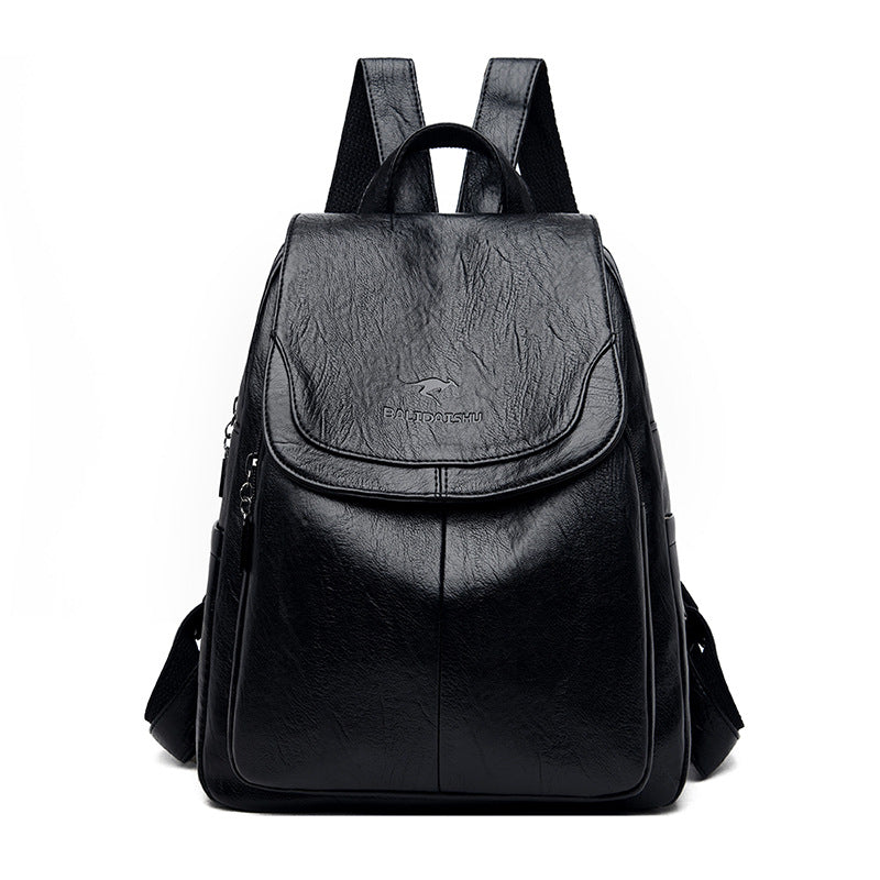 Black faux leather backpack with a flap top, top handle, adjustable straps, and Balidaishu logo on a white background.