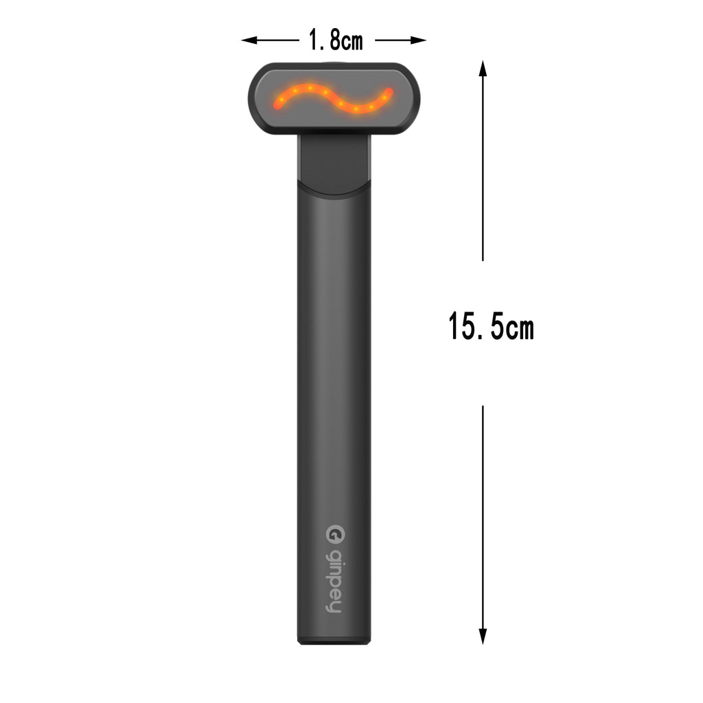 Matte black 4-in-1 facial wand with T-shaped head, glowing orange LED light therapy, and dimensional measurement arrows.