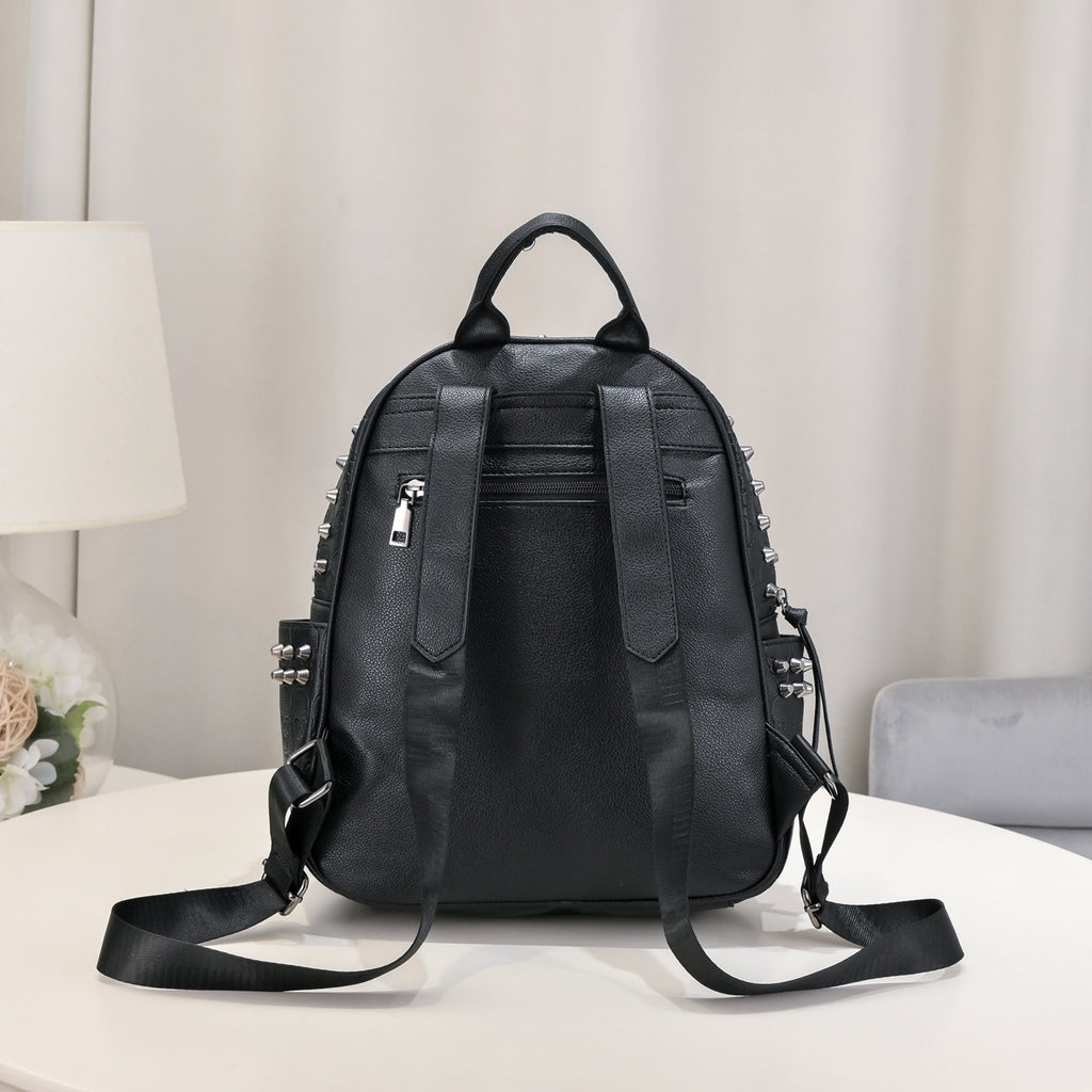 Black soft leather leisure backpack with silver rivets, adjustable straps, and a zippered back pocket.