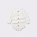 Off-white long-sleeve ribbed knit baby bodysuit featuring a front button placket and snap closure at the crotch.