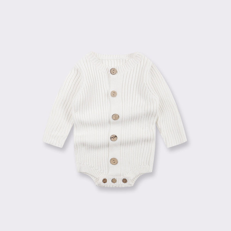 Off-white long-sleeve ribbed knit baby bodysuit featuring a front button placket and snap closure at the crotch.
