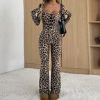 Slim-fit, long-sleeve leopard print jumpsuit with a square neckline and flare-leg design.