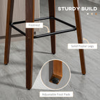Dark wood bar stool featuring solid poplar legs, a black metal footrest, and adjustable non-slip foot pads.