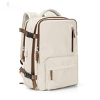 Beige waterproof travel backpack with brown zippers, side buckled straps, multiple pockets, and padded shoulder straps.