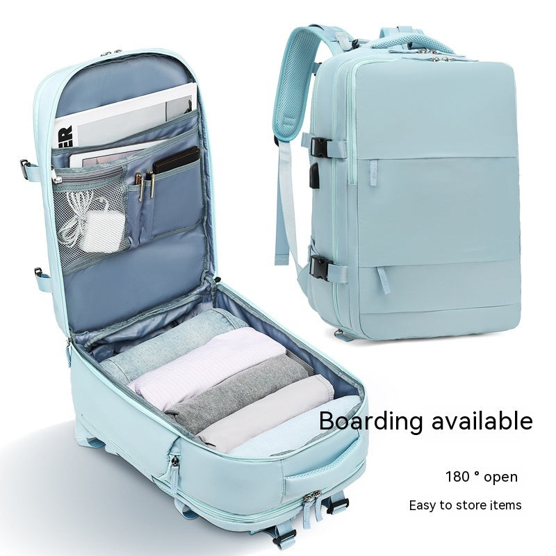 Light blue, waterproof travel backpack with a 180-degree opening, multiple storage pockets, and organized compartments.